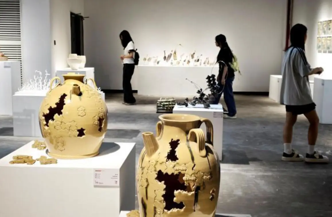 Gallery installation of glazed ceramic vessels at a museum exhibition