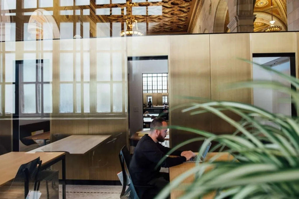 A café interior with ceramic service on the counter